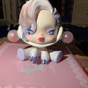 Cute Pastel Figurine with Pink and Blue Accents